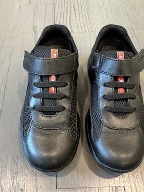 Prada Kids Black Sneakers with Red Logo Tab